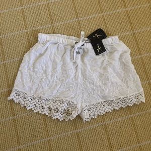 White flowy crochet shorts